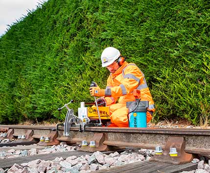 Rail Engineer Working On Rail Track